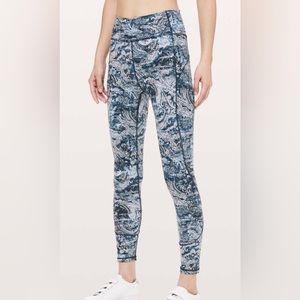 Lululemon in movement, tight, everlux fabric, 25” inseam, blue/green paisley-sz4